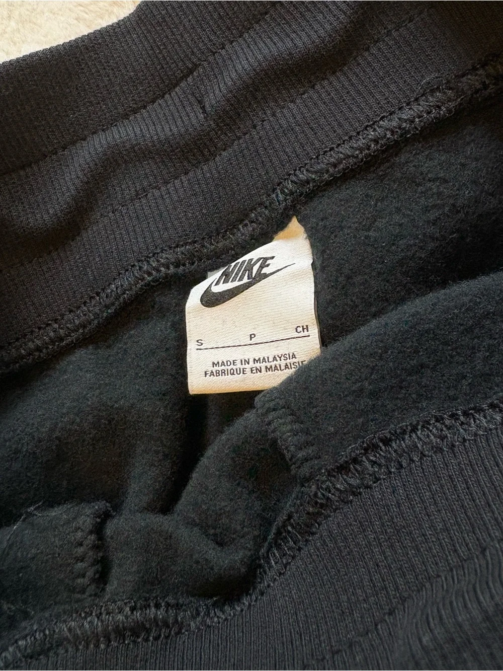 Nike Black Sweatpants with Light Blue Spelman Logo